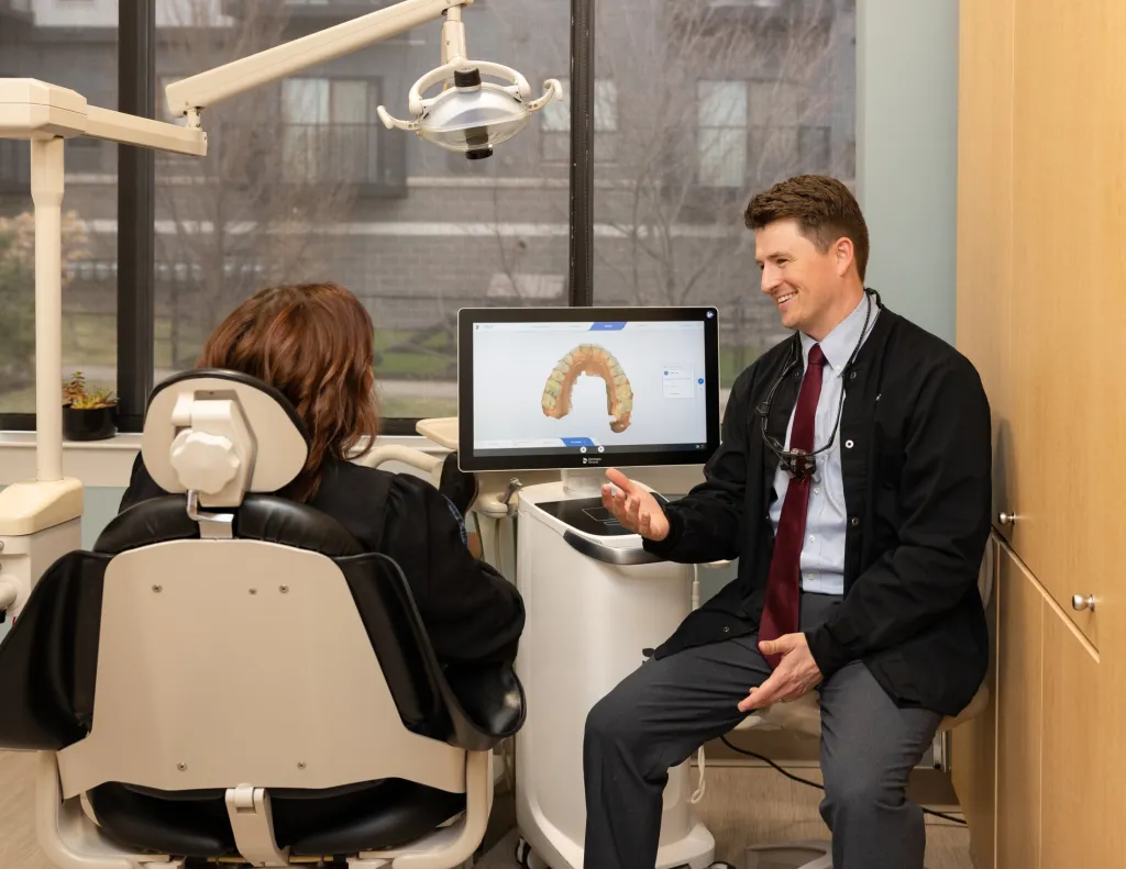 Dr. White explaining dental scan to patient